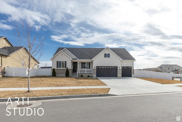 view of front of house featuring fence, roof with shingles, driveway, stucco siding, and a garage