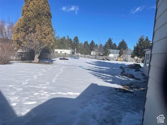 161 E 4th S, Soda Springs, ID 83276 - snowy yard featuring fence