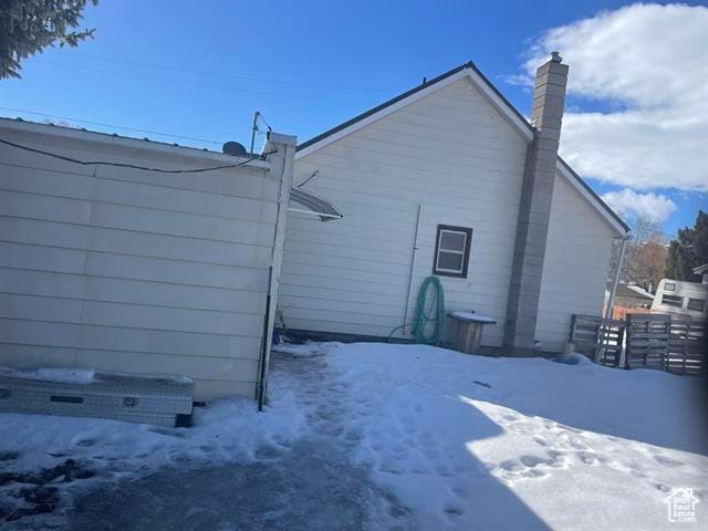 161 E 4th S, Soda Springs, ID 83276 - snow covered house featuring fence