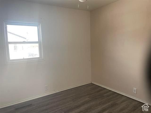 161 E 4th S, Soda Springs, ID 83276 - unfurnished room with dark wood-style flooring and baseboards