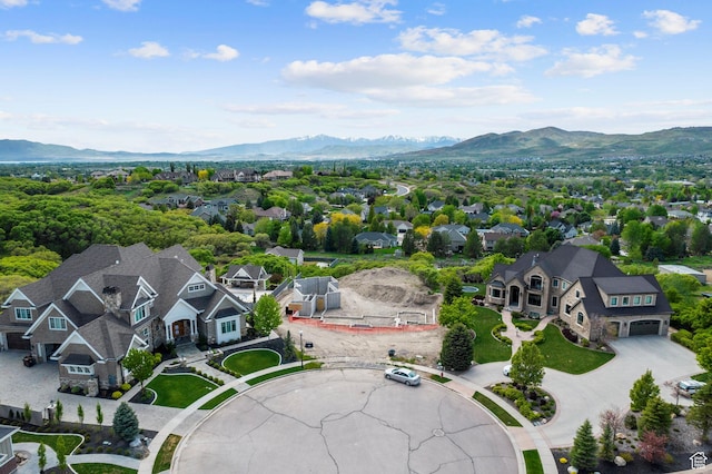 birds eye view of property featuring a residential view and a mountain view