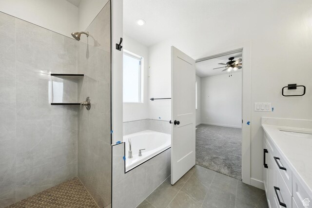 4068 S Porter Ave, South Ogden, UT 84403 - bathroom featuring a bath, a tile shower, vanity, ceiling fan, and tile patterned flooring