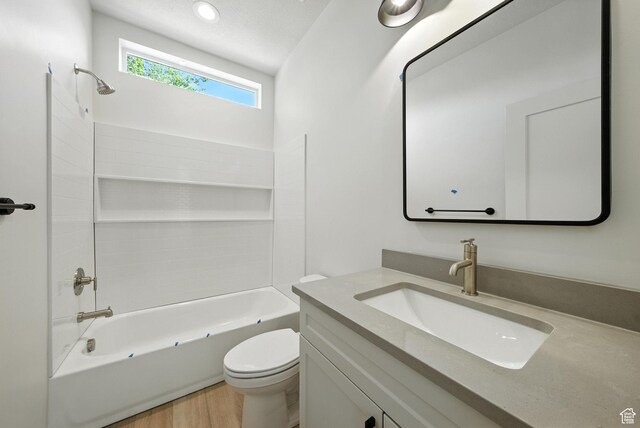 4068 S Porter Ave, South Ogden, UT 84403 - bathroom featuring vanity, washtub / shower combination, and wood finished floors
