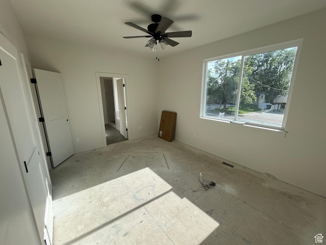 4068 Porter Ave, South Ogden, UT 84403 - unfurnished bedroom with connected bathroom and ceiling fan