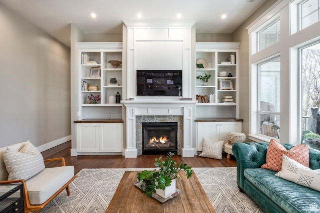 884 E Fence Post Rd S, Fruit Heights, UT 84037 - living area featuring dark wood-style floors, recessed lighting, baseboards, and a tiled fireplace