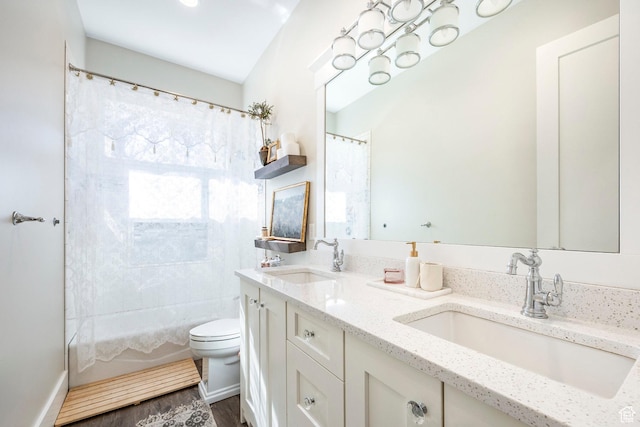 884 E Fence Post Rd S, Fruit Heights, UT 84037 - bathroom featuring toilet, double vanity, a sink, and wood finished floors