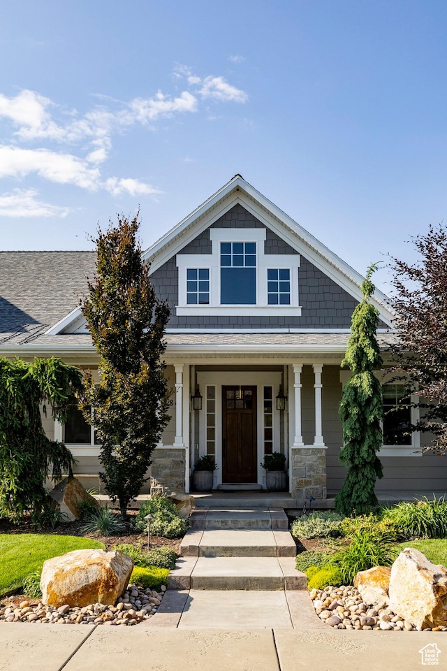 884 E Fence Post Rd S, Fruit Heights, UT 84037 - craftsman house featuring a porch, stone siding, and roof with shingles
