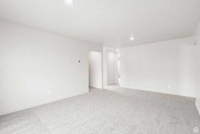 3537 S 3150 W Unit 106, West Haven, UT 84401 - spare room with baseboards, recessed lighting, and light colored carpet