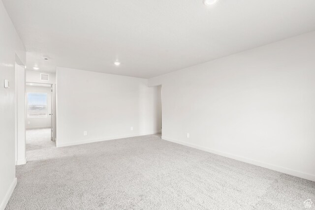3537 S 3150 W Unit 106, West Haven, UT 84401 - empty room with light colored carpet, visible vents, recessed lighting, and baseboards