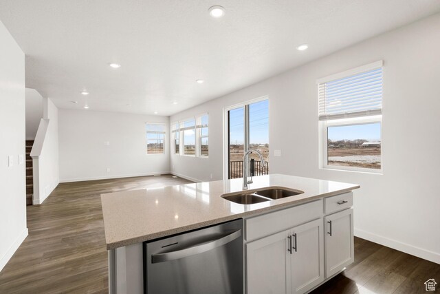 3537 S 3150 W Unit 106, West Haven, UT 84401 - kitchen featuring a sink, stainless steel dishwasher, a kitchen island with sink, white cabinets, and dark wood-type flooring