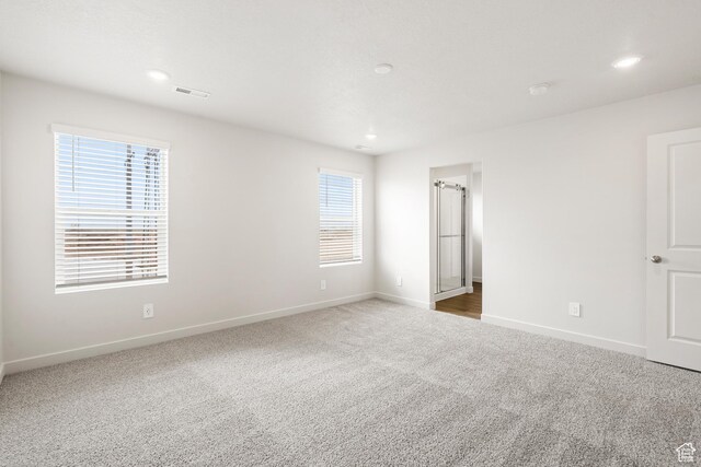 3537 S 3150 W Unit 106, West Haven, UT 84401 - unfurnished bedroom featuring recessed lighting, carpet, baseboards, and visible vents