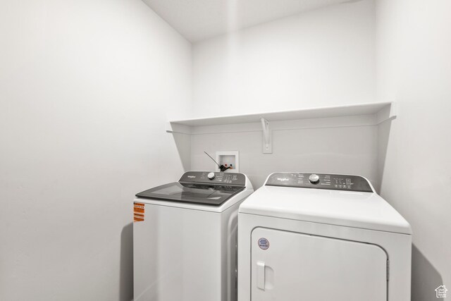 3537 S 3150 W Unit 106, West Haven, UT 84401 - washroom featuring laundry area and separate washer and dryer