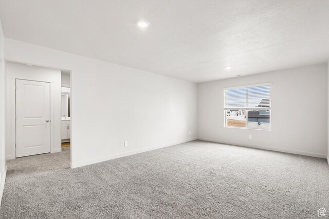 3537 S 3150 W Unit 106, West Haven, UT 84401 - carpeted spare room with baseboards and recessed lighting