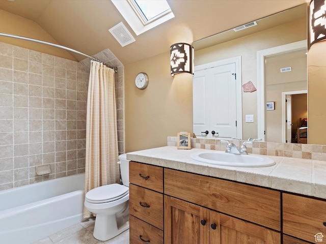 bathroom featuring visible vents, toilet, and tile patterned floors