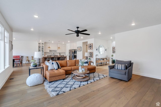 903 E 200 S, Pleasant Grove, UT 84062 - living area featuring baseboards, light wood-style flooring, and recessed lighting