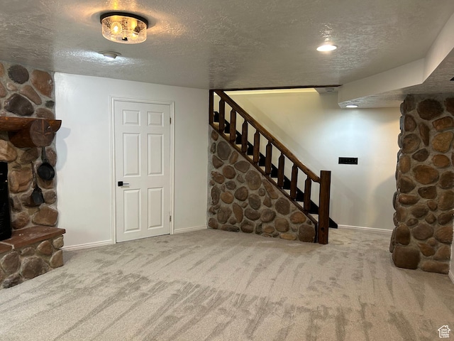 829 E 1925 N, North Ogden, UT 84414 - finished basement featuring carpet flooring, a textured ceiling, baseboards, and stairs
