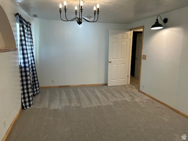 829 E 1925 N, North Ogden, UT 84414 - carpeted spare room with a chandelier and baseboards