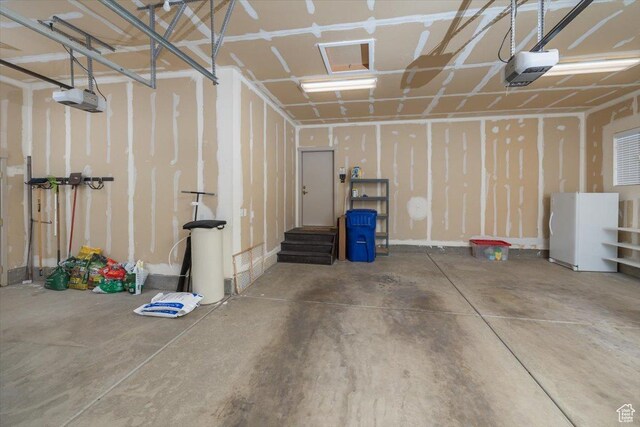 3879 S Mcgregor Ln, Saratoga Springs, UT 84045 - garage featuring a garage door opener