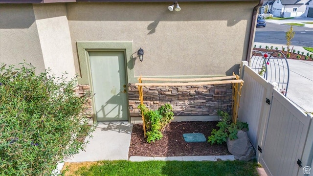 3879 S Mcgregor Ln, Saratoga Springs, UT 84045 - entrance to property featuring stone siding and stucco siding