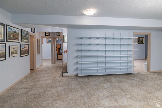 3879 S Mcgregor Ln, Saratoga Springs, UT 84045 - interior space with a textured ceiling and baseboards