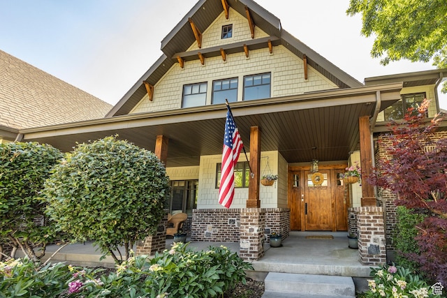 doorway to property with a porch