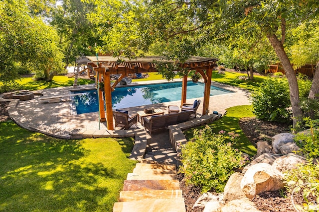 outdoor pool featuring a patio area, an outdoor fire pit, and a lawn