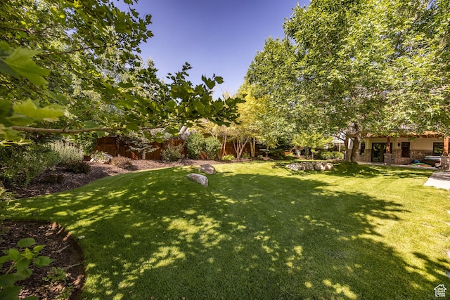 view of yard featuring fence