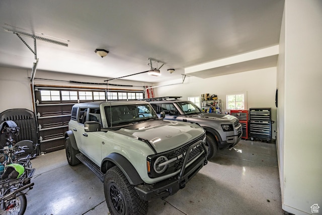 garage featuring a garage door opener