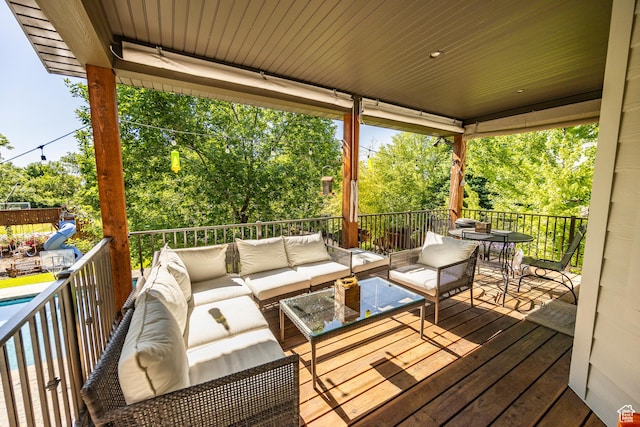 deck featuring an outdoor living space