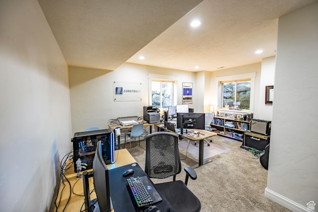 home office featuring baseboards, carpet floors, a textured ceiling, and recessed lighting