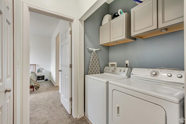 12793 S Timber Run Dr W, Riverton, UT 84096 - laundry room featuring light colored carpet, baseboards, cabinet space, and washing machine and clothes dryer