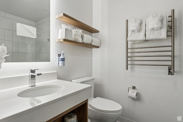 2670 W Canyons Resort Dr Unit 325, Park City, UT 84098 - bathroom with radiator, toilet, walk in shower, and vanity
