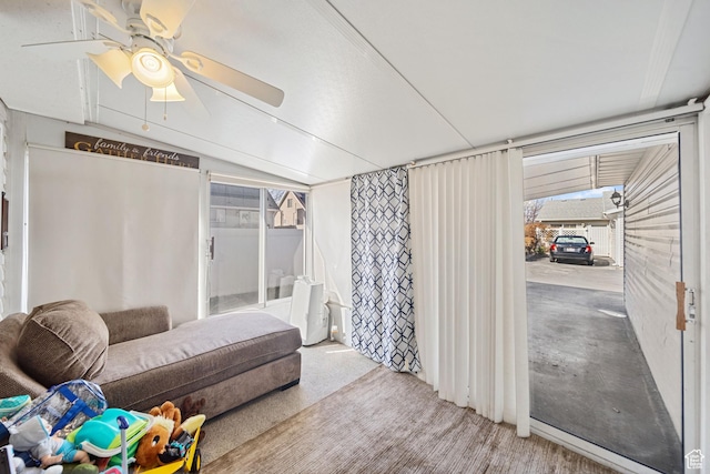 bedroom with ceiling fan and carpet flooring