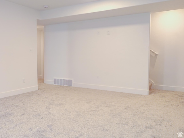 interior space featuring baseboards and visible vents