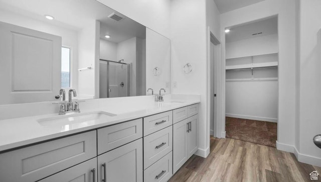 1726 S Wolverine Way Unit 174, Washington, UT 84780 - full bath featuring visible vents, a stall shower, double vanity, and a sink