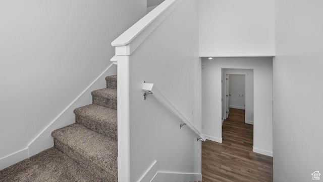 1726 S Wolverine Way Unit 174, Washington, UT 84780 - staircase featuring wood finished floors and baseboards