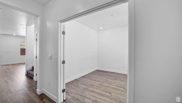 1726 S Wolverine Way Unit 174, Washington, UT 84780 - corridor with baseboards and wood finished floors