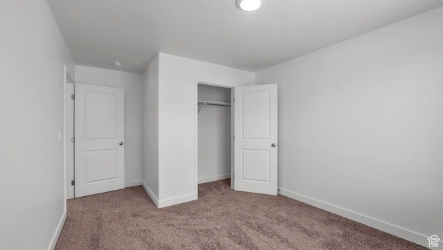 1726 S Wolverine Way Unit 174, Washington, UT 84780 - unfurnished bedroom featuring a closet, carpet, and baseboards