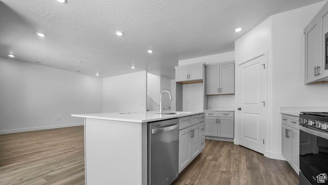 1726 S Wolverine Way Unit 174, Washington, UT 84780 - kitchen featuring recessed lighting, stainless steel appliances, wood finished floors, and a sink