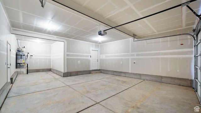1726 S Wolverine Way Unit 174, Washington, UT 84780 - garage with secured water heater and a garage door opener