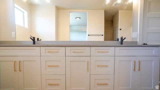 954 W 1880 S, Syracuse, UT 84075 - bathroom featuring double vanity, a sink, and visible vents
