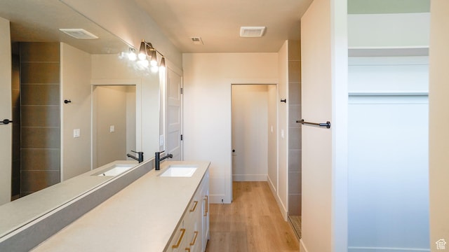 954 W 1880 S, Syracuse, UT 84075 - full bathroom with visible vents, wood finished floors, and vanity