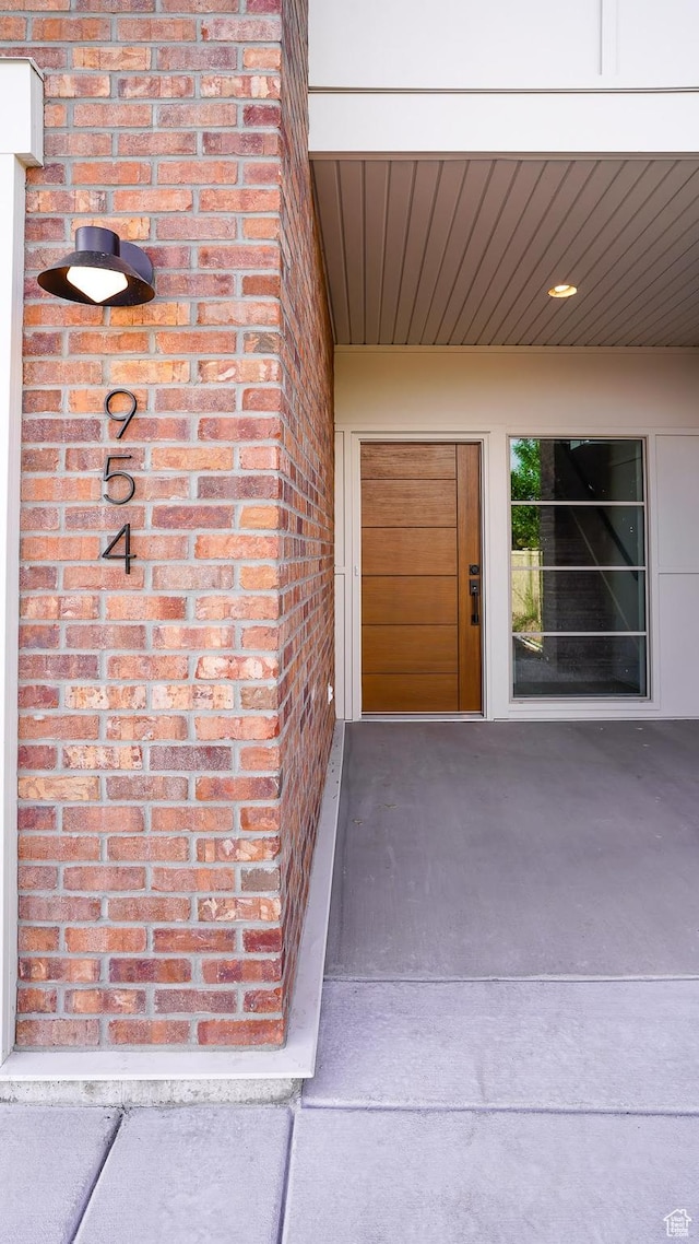 954 W 1880 S, Syracuse, UT 84075 - view of exterior entry featuring brick siding