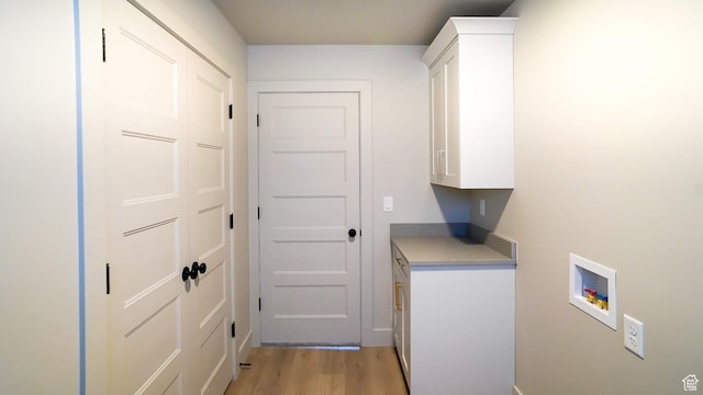954 W 1880 S, Syracuse, UT 84075 - laundry area featuring light wood-style flooring, washer hookup, and cabinet space