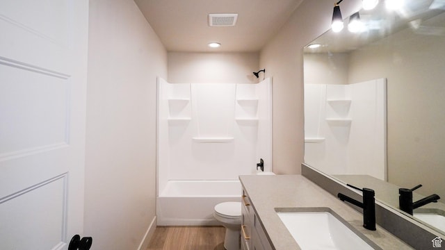954 W 1880 S, Syracuse, UT 84075 - bathroom with toilet, wood finished floors, visible vents, vanity, and tub / shower combination