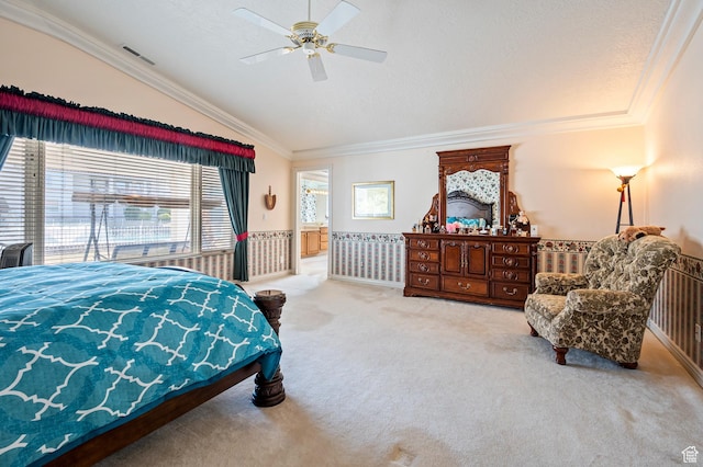 150 S Crystal Lakes Dr Unit 48, St George, UT 84770 - bedroom with ornamental molding, visible vents, vaulted ceiling, and carpet floors