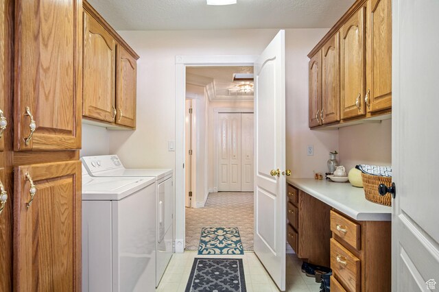 150 S Crystal Lakes Dr Unit 48, St George, UT 84770 - laundry area with cabinet space, independent washer and dryer, a textured ceiling, and light floors