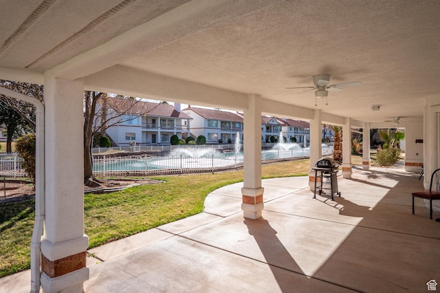 150 S Crystal Lakes Dr Unit 48, St George, UT 84770 - view of patio / terrace featuring a residential view, fence, and a ceiling fan