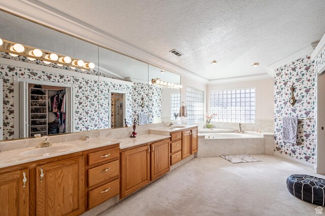 150 S Crystal Lakes Dr Unit 48, St George, UT 84770 - bathroom with a textured ceiling, a sink, visible vents, ornamental molding, and wallpapered walls