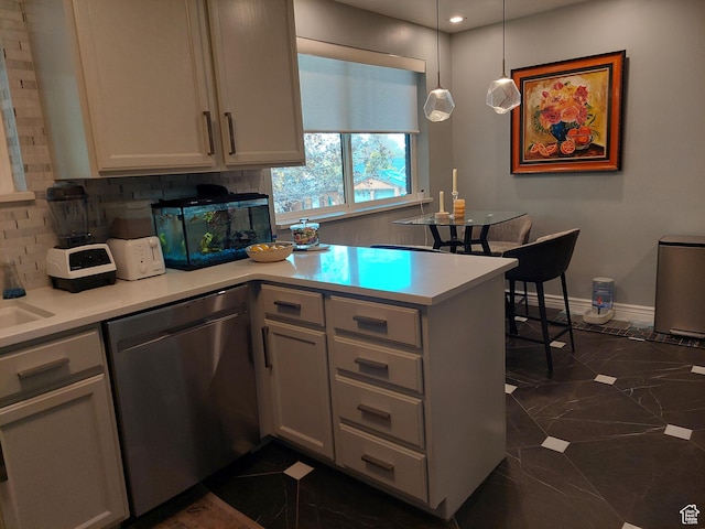 7688 S 1130 E, Midvale, UT 84047 - kitchen with tasteful backsplash, stainless steel dishwasher, light countertops, recessed lighting, and a peninsula